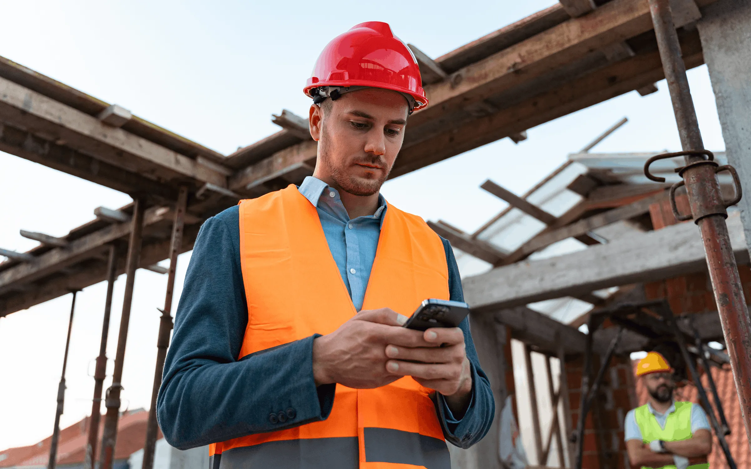 Construction worker using his phone