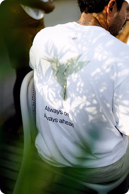 Back of a Nagomi t-shirt reading Always on, always ahead