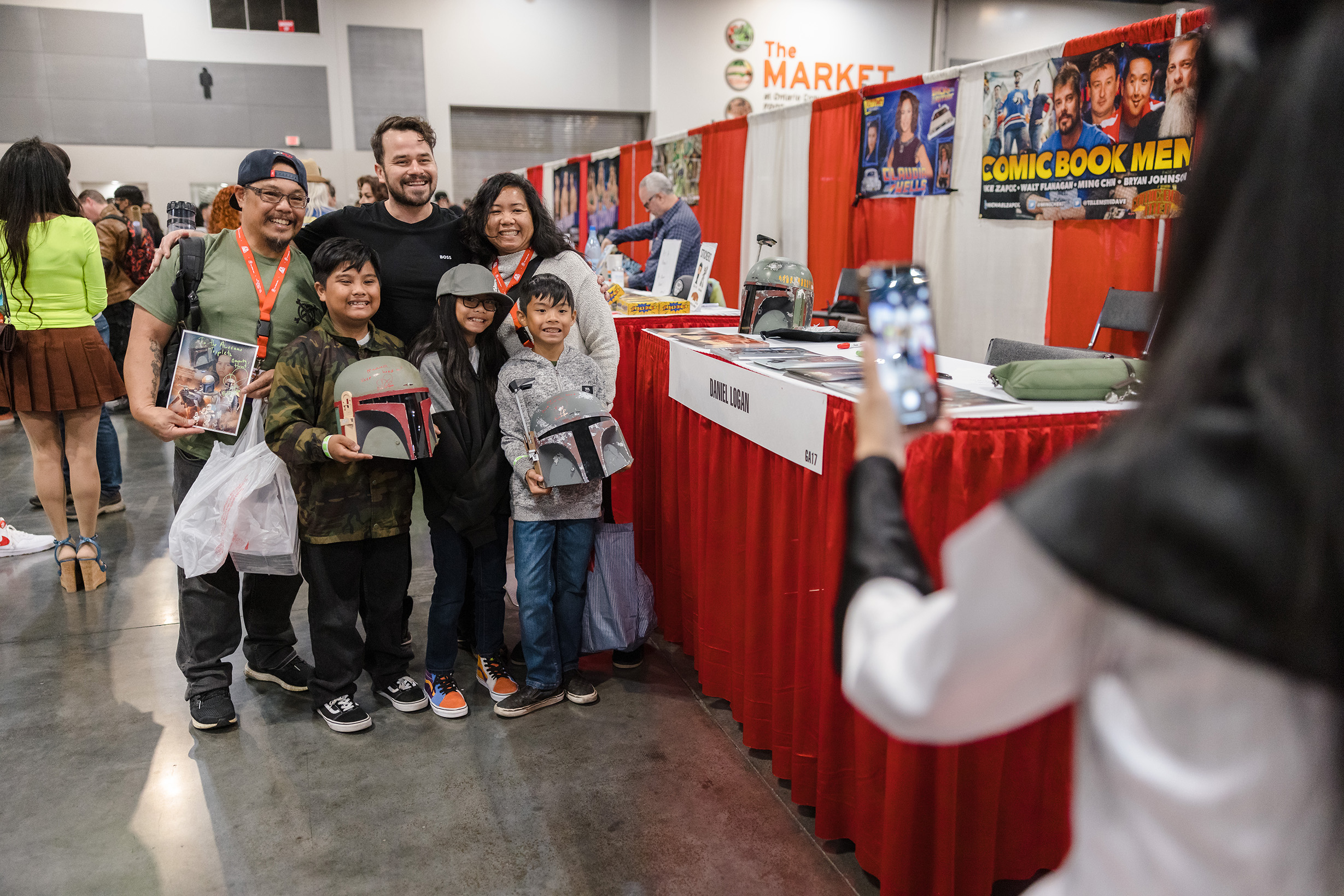 Cosplayers with Actor Daniel Logan at Comic Con. Comic Con Discount Codes