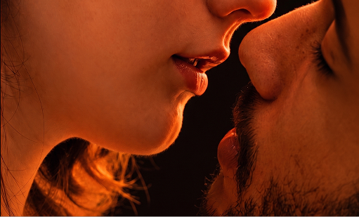 A couple about to kiss
