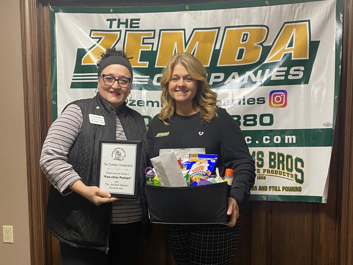 The Zemba Companies receiving a Paw-sitive Partner award from The Animal Shelter Society Inc.
