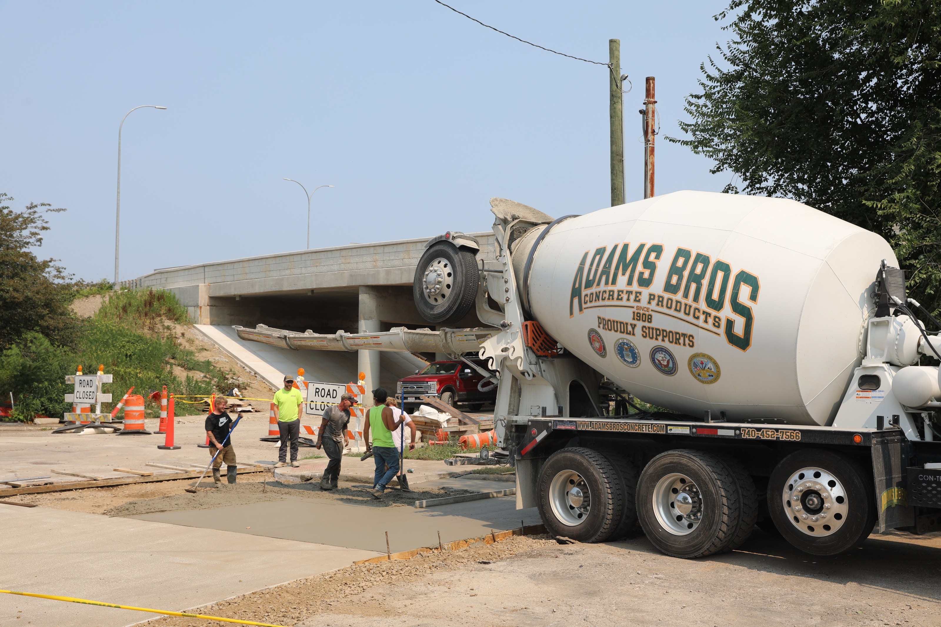Adams Bros. crew pouring concrete on a job site