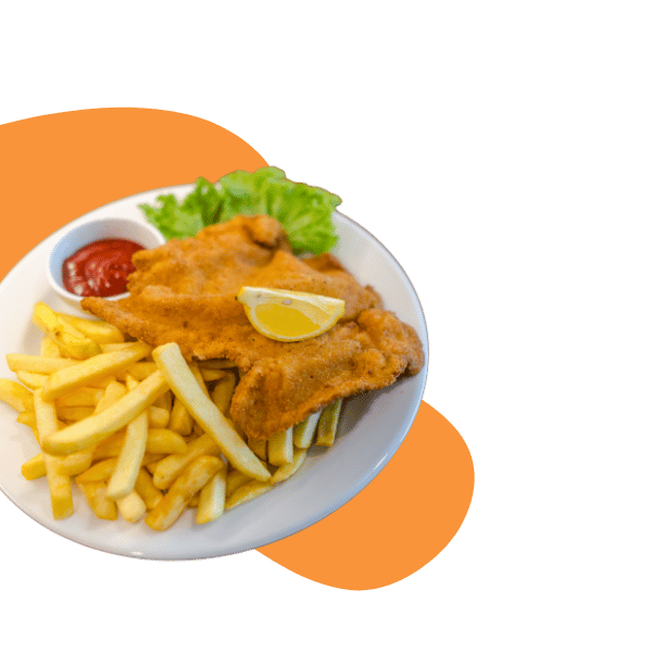 Kotlet schabowy z frytkami, sałatą i czipsem pomidorowym na białym talerzu.