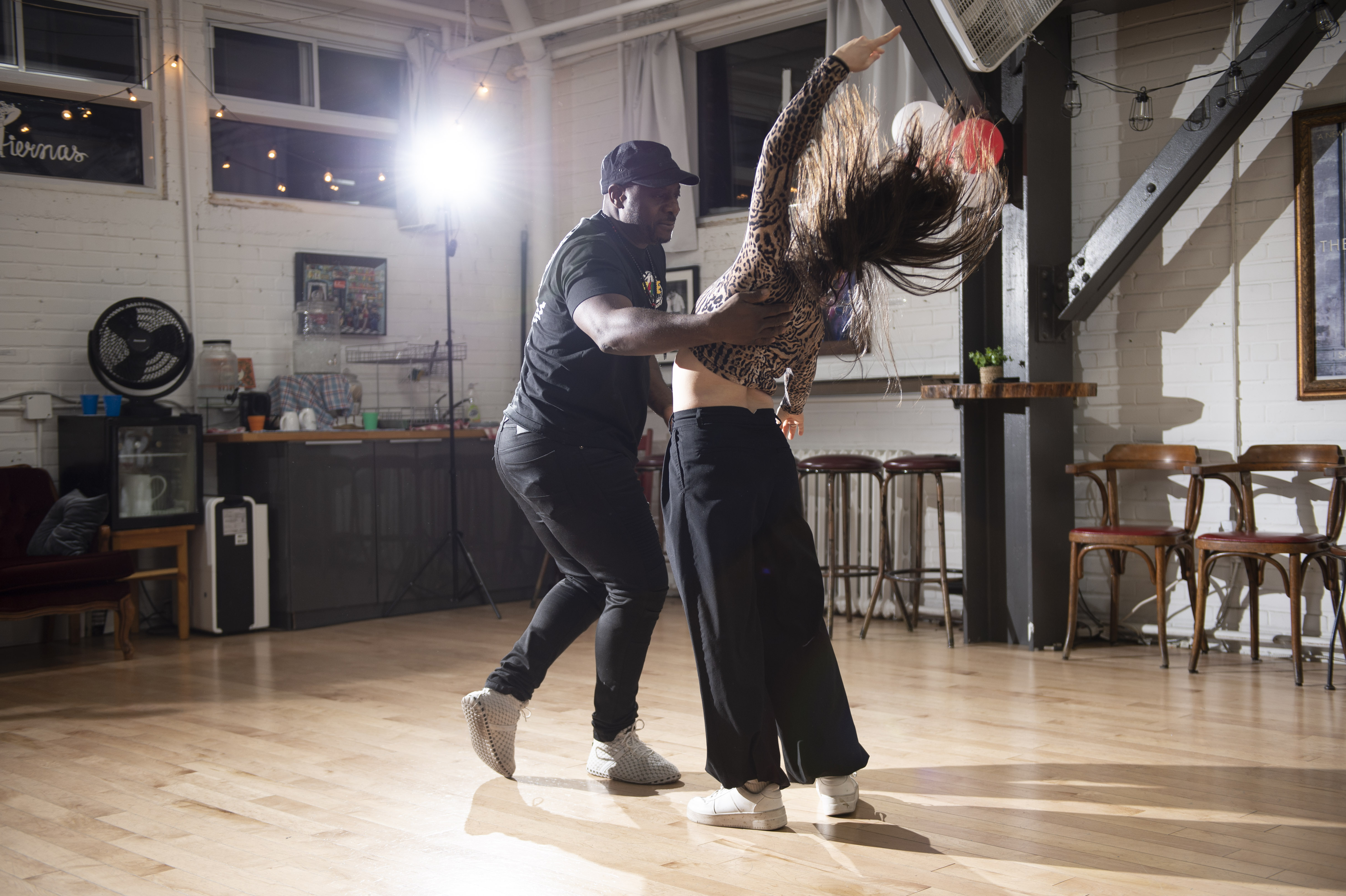 image of dance instructor teaching a class