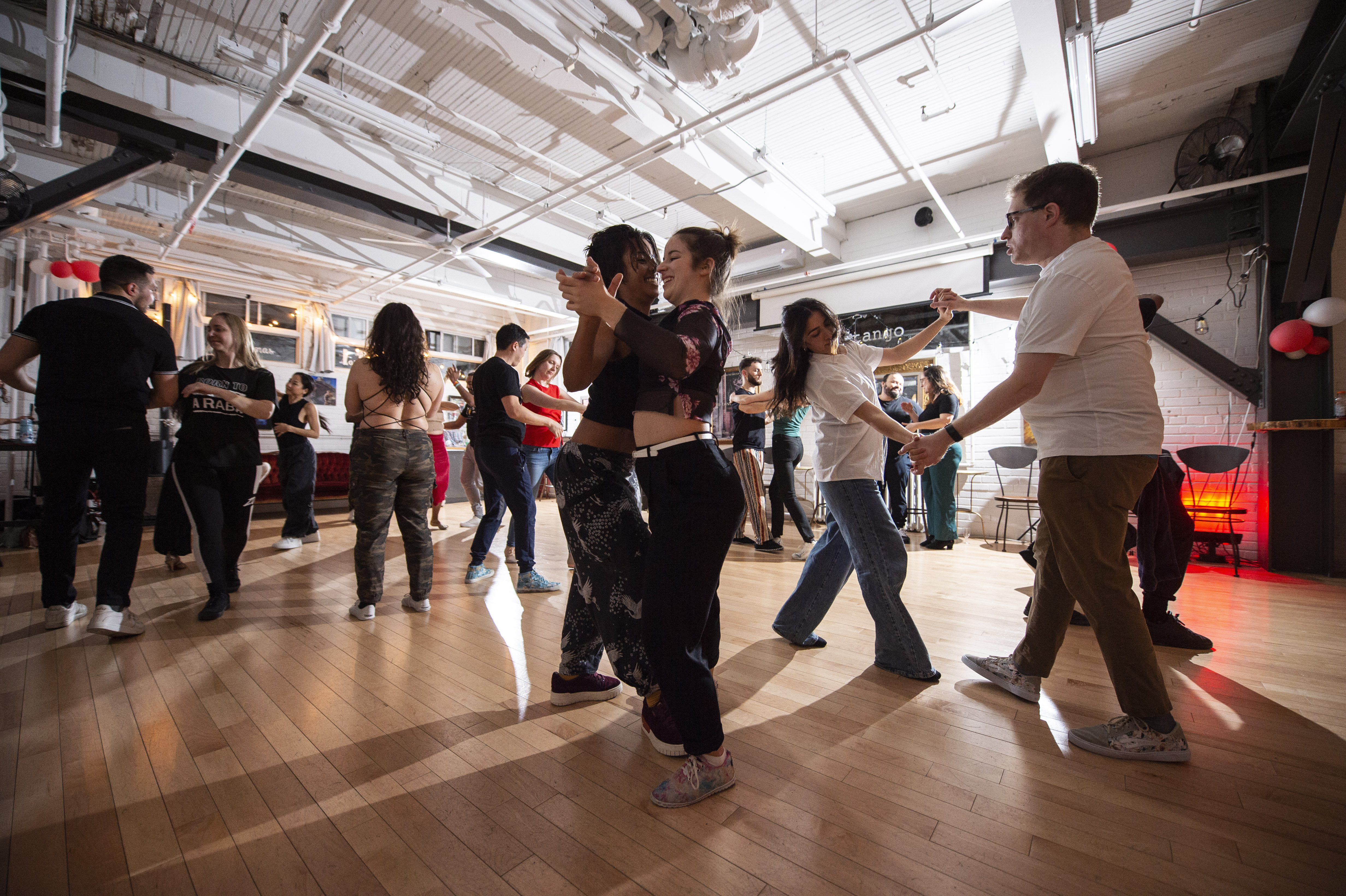 image of dance instructor teaching a class