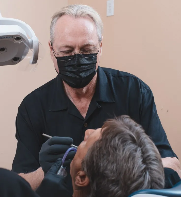 Dr. Cutts treating a patient