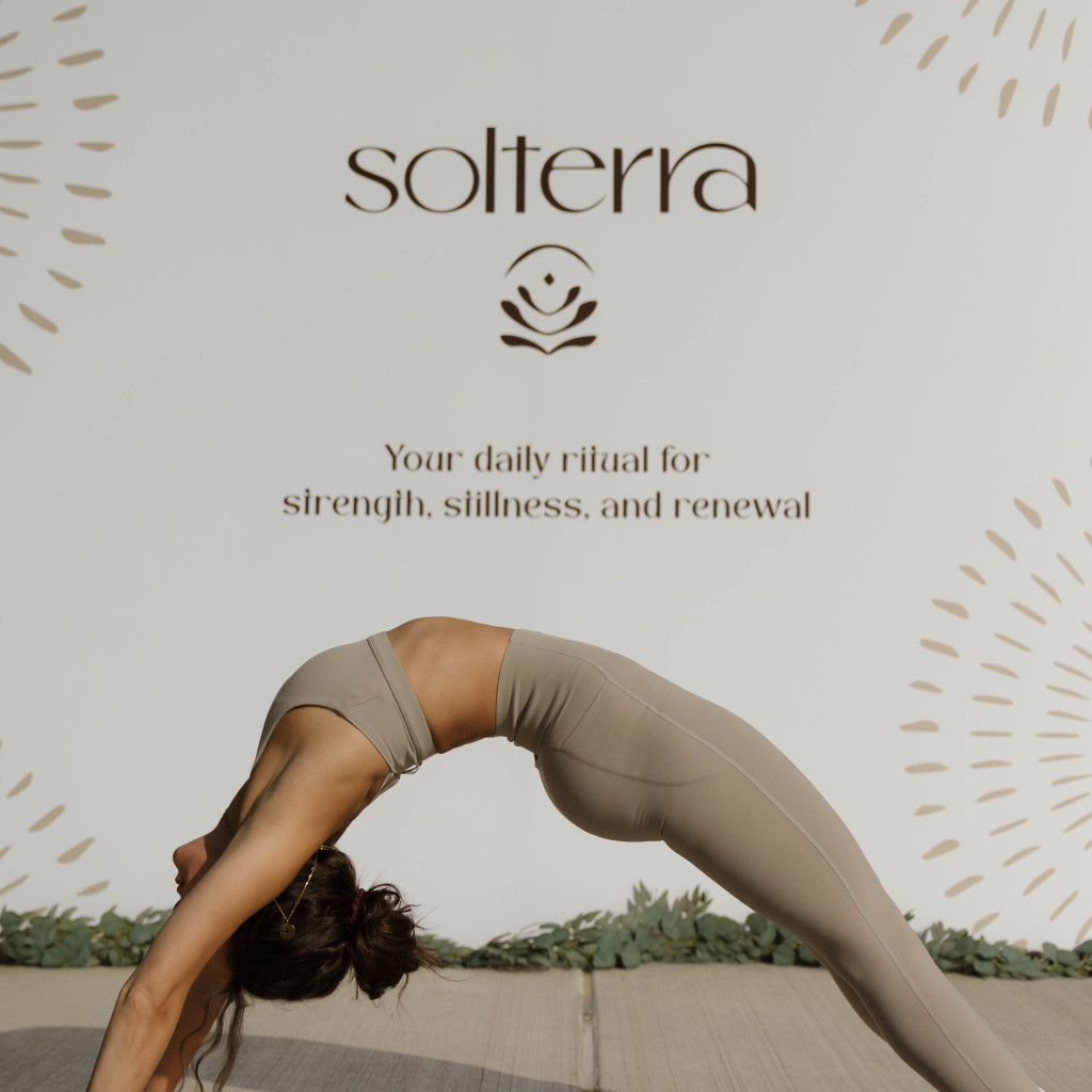 Guest practicing yoga during a Solterra outdoor event at The Galaxy at Polaris