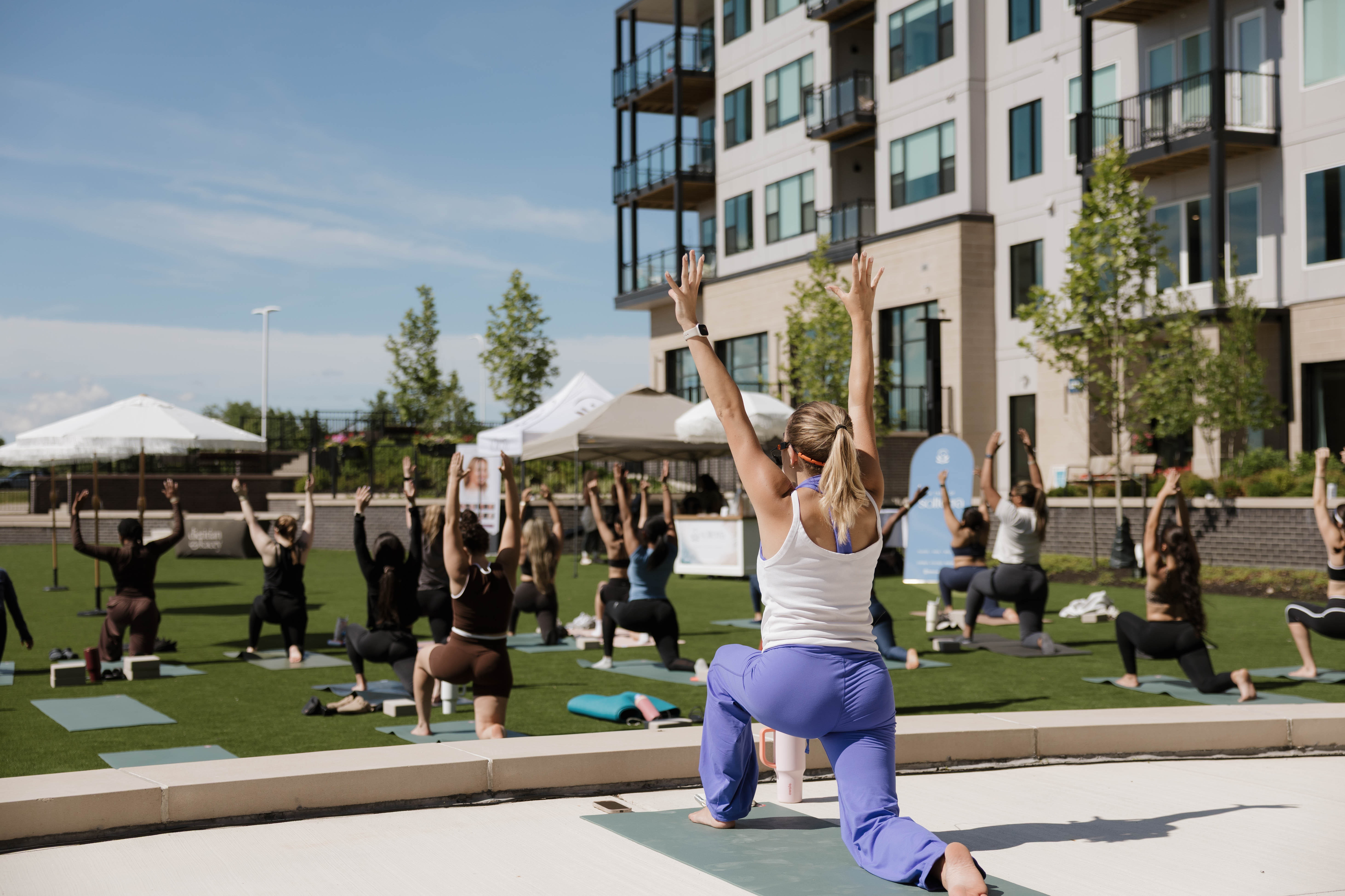 Guests practicing Mat Pilates during Solterra Saturdays at The Galaxy at Polaris