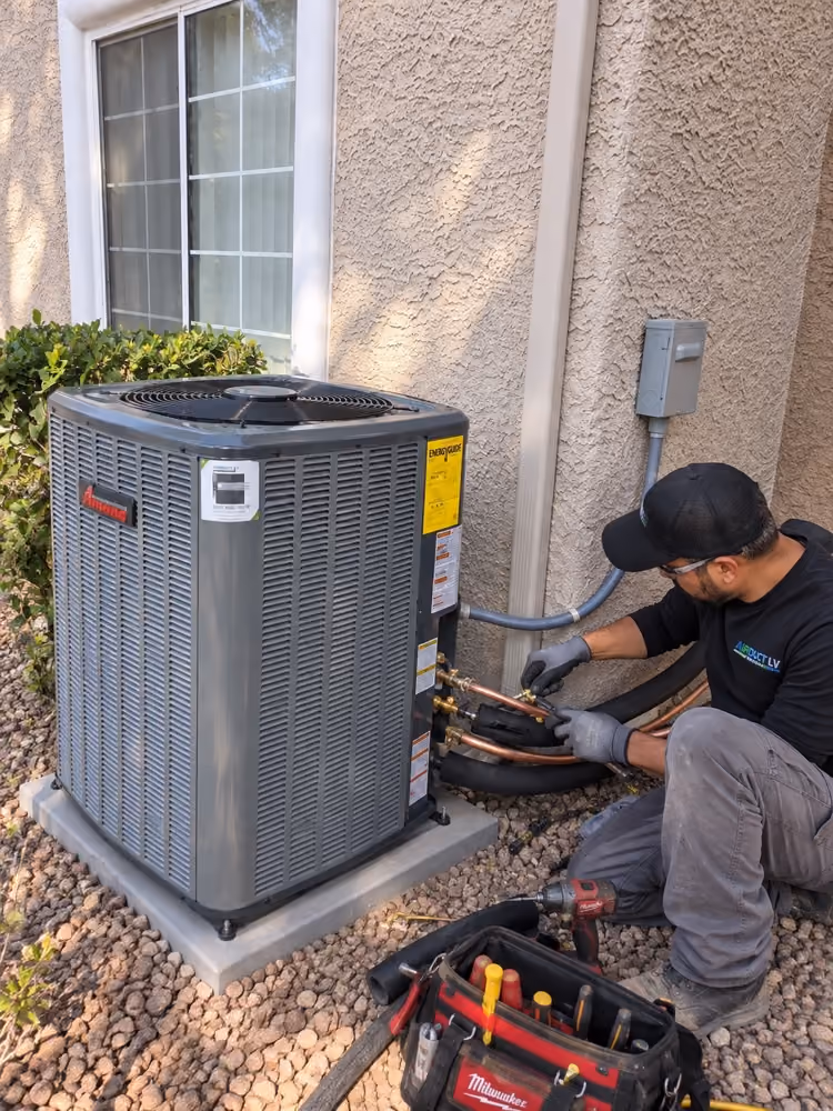 Air Duct LV technician installing a new HVAC system.