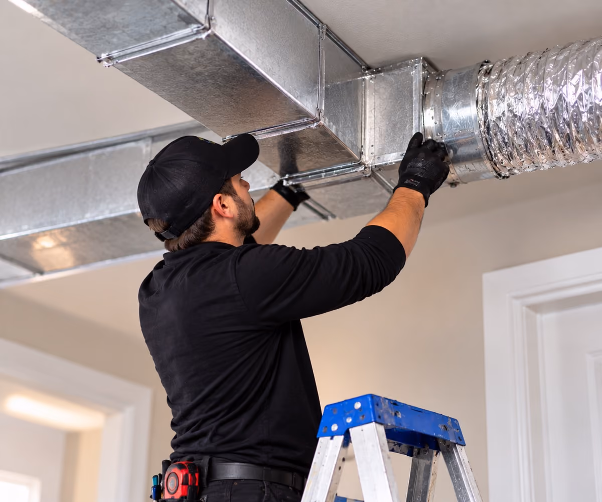Air Duct LV technician repairing damaged ductwork.