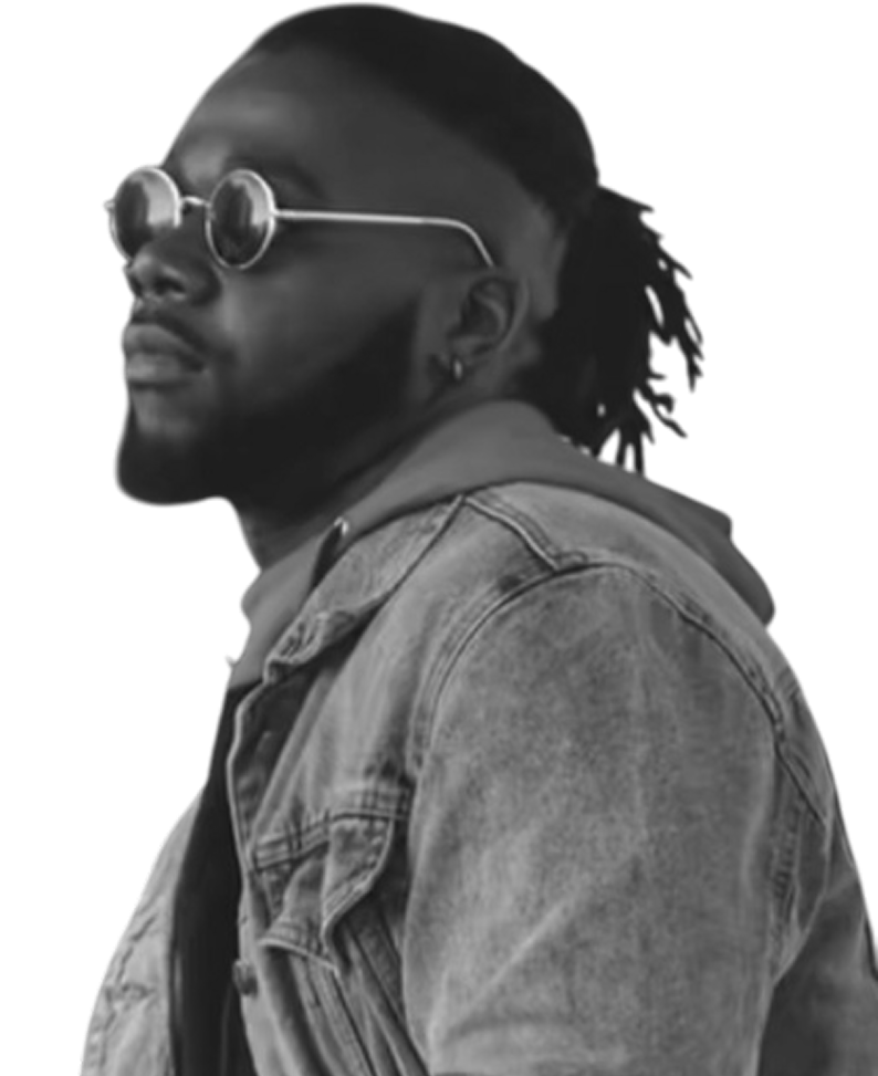 Man wearing sunglasses and a denim jacket.