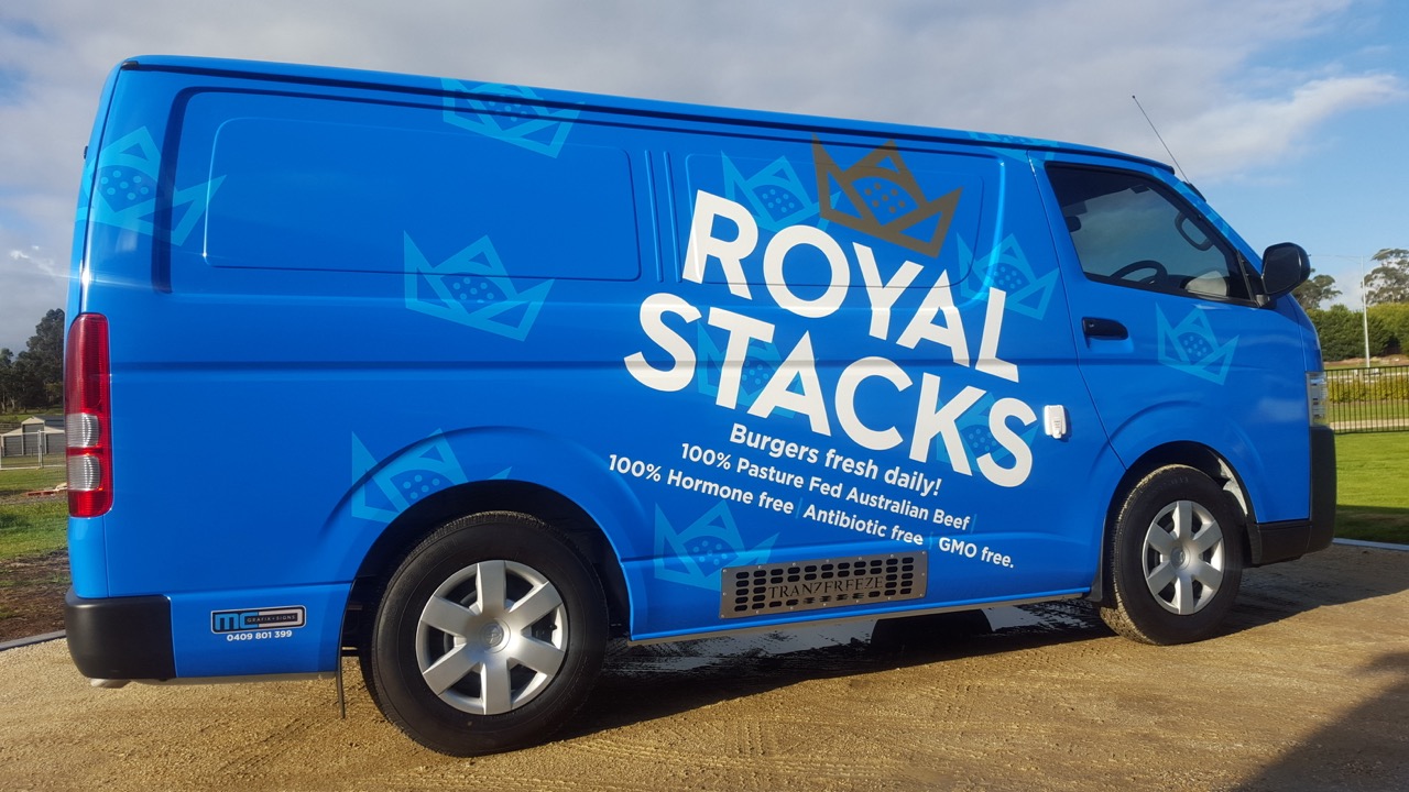A blue Royal Stacks burger van showing quality vehicle signage wrap by MC Grafix