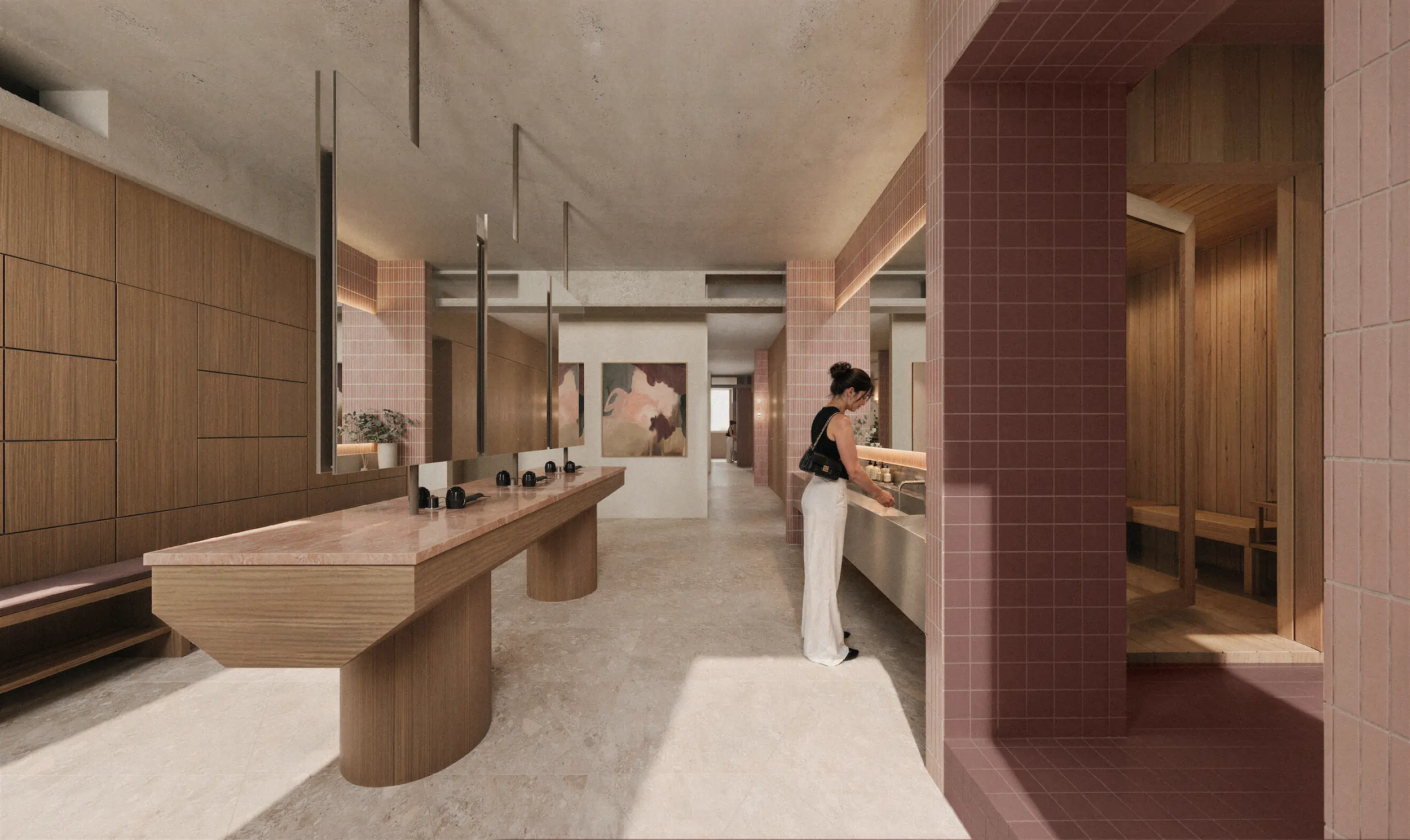 Modern public restroom with beige tiled floor and pink tiled column; long wooden vanity with multiple sinks and mirrors; woman washing hands at sink on the right; wooden panel walls and a passageway to another room with wood interior.