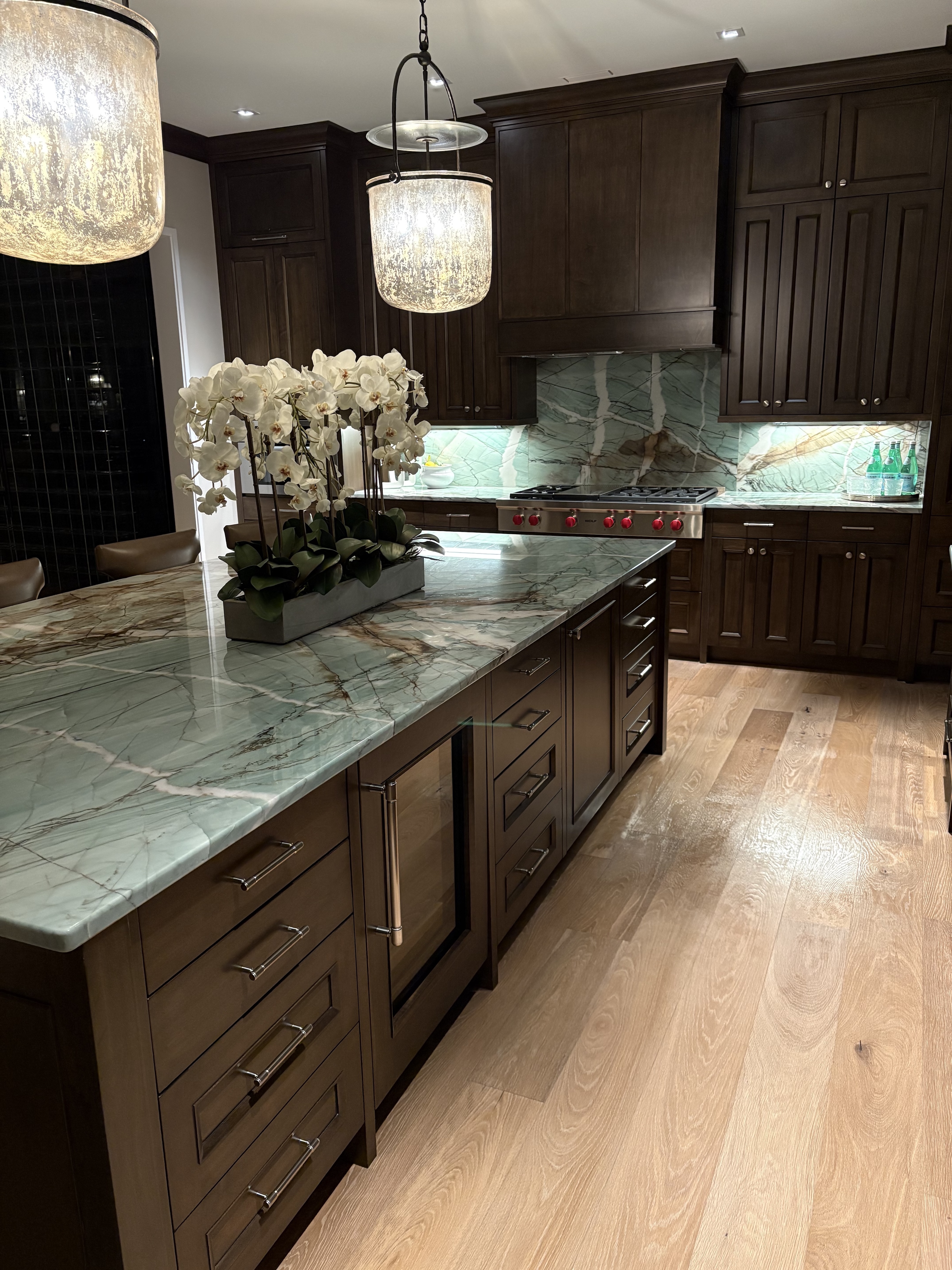 New-build kitchen with stone counters cleaned by Pure Grace Cleaning Co.