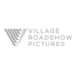 Village Roadshow logo in gray text on a clear background.