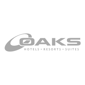 Oaks Hotels wordmark logo in gray text.