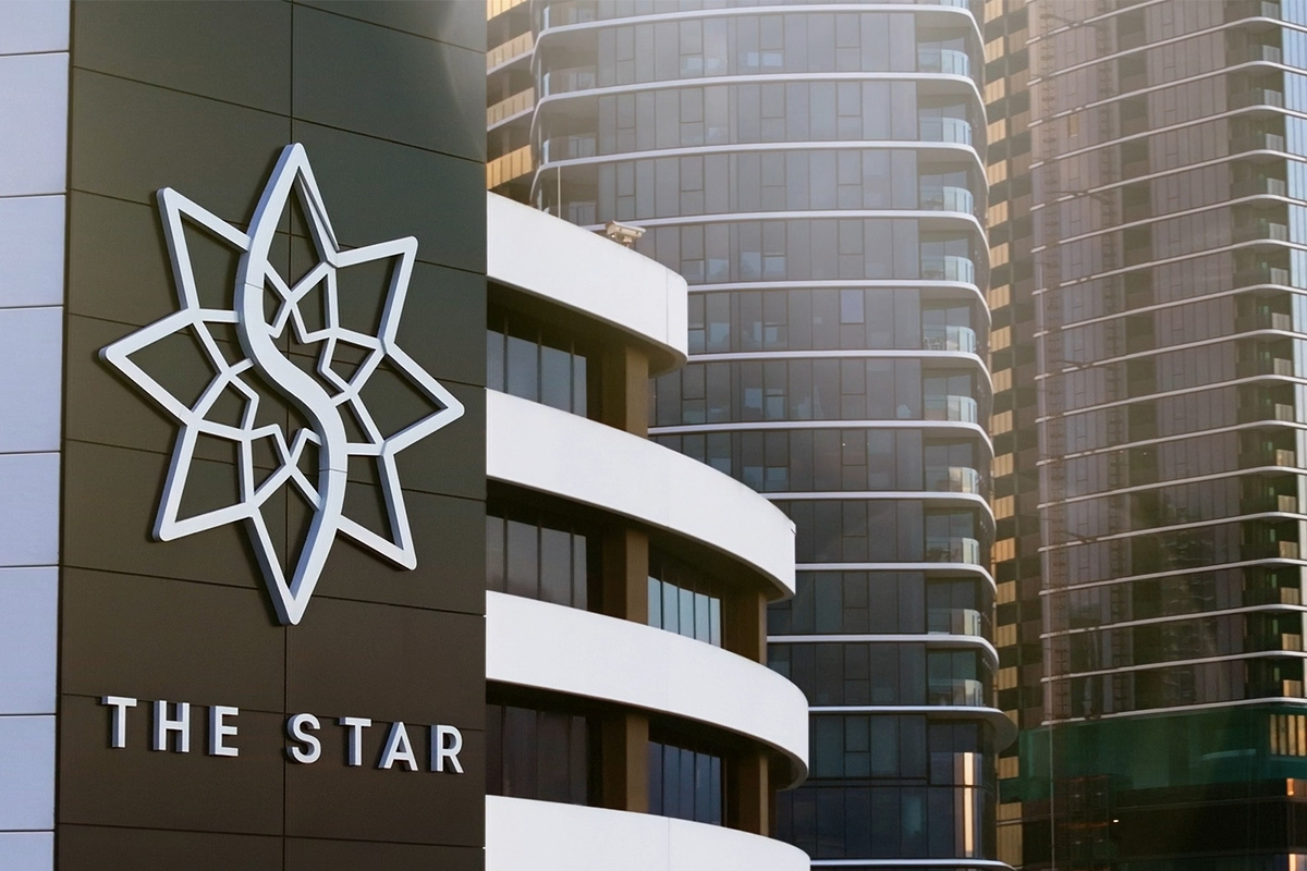 Modern building exterior with a large geometric star logo and the text 'THE STAR'.