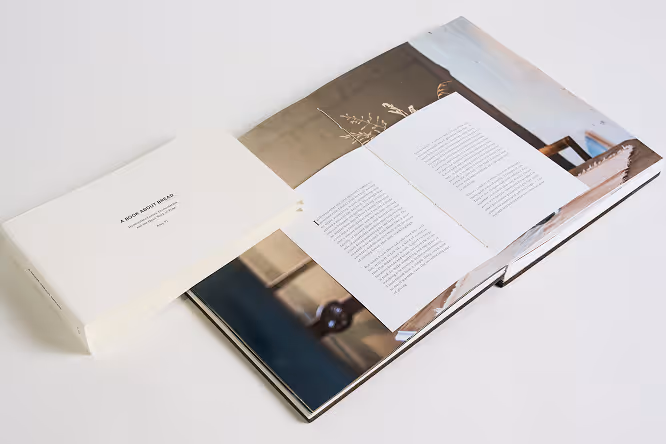 A photographed interior spread showcasing the publication’s layout system, components, pacing, and material qualities. The composition highlights the relationship between imagery, typography, and negative space, reinforcing the publication’s quiet and tactile reading experience.
Photography by Tommy-Paul Keo
