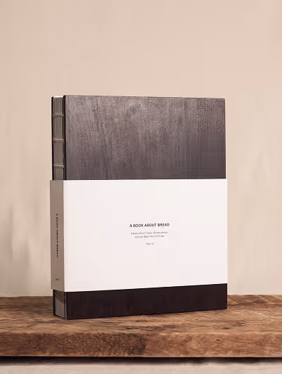 A cookbook exploring breadmaking through slow processes, tactile materials, and quiet editorial pacing. The restrained typography and muted cover composition reflect themes of patience, craftsmanship, and simplicity.
Photography by Tommy-Paul Keo