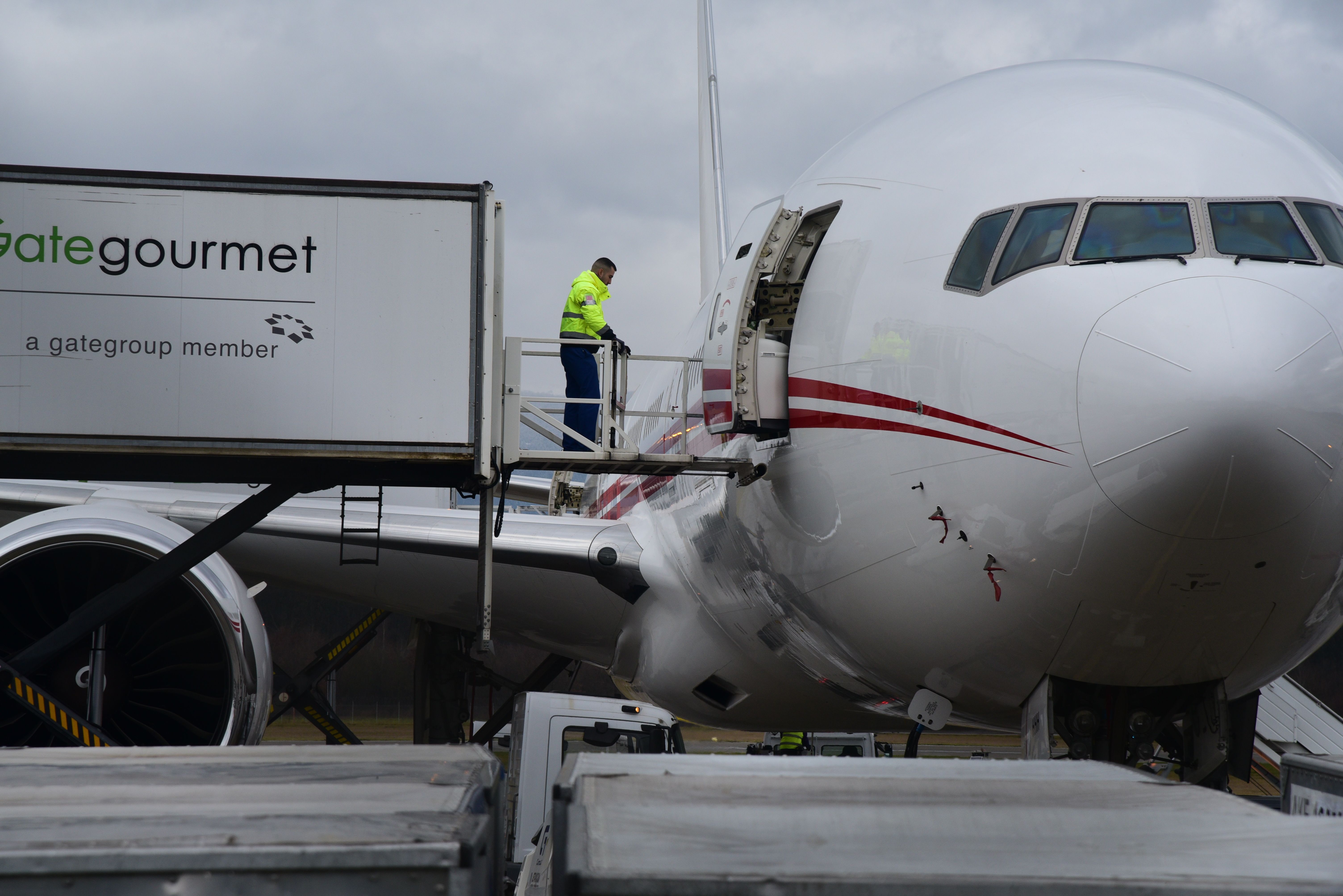 An airplane receiving it's catered meals for a flight, which are produced in mass, not typically in celiac safe environments.