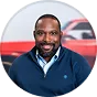 Customer testimonial portrait for Reed Global finance leadership