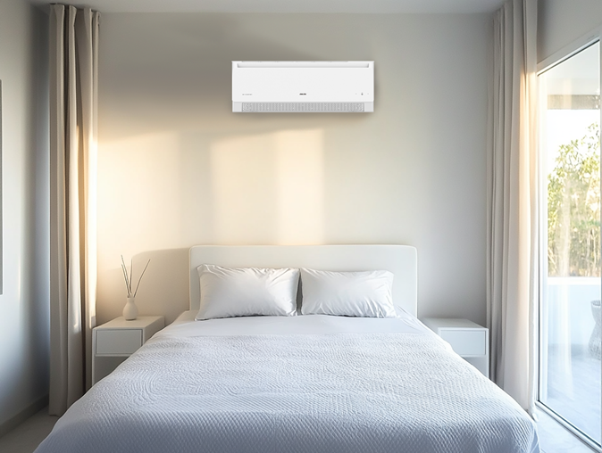 AUX air conditioner in a clean and bright bed room
