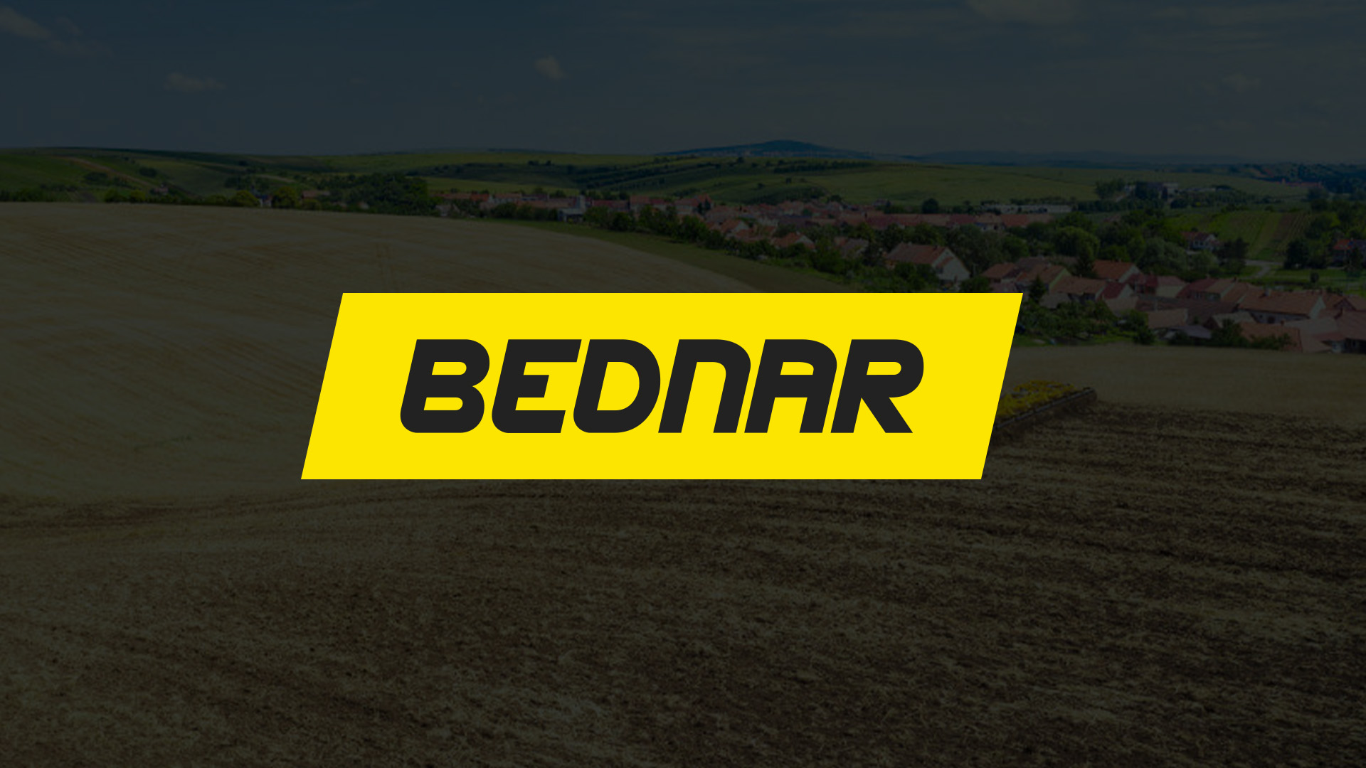 Yellow rectangular banner with bold black text reading 'BEDNAR' over a farmland landscape with plowed field and distant houses under a partly cloudy sky.