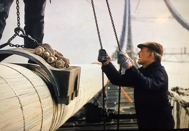 A video screenshot from the building of the Forth Road Bridge in Scotland