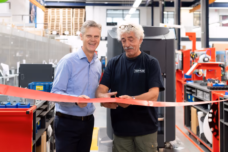 Fast & Fluid ribbon-cutting ceremony