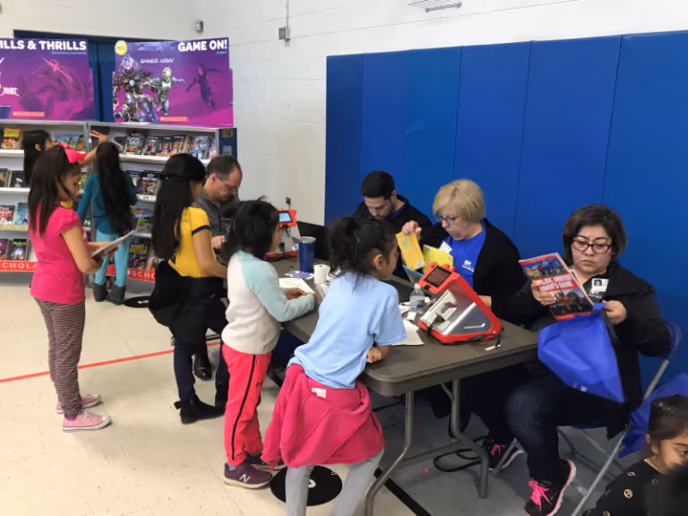 Jane Addams Elementary school students purchasing books