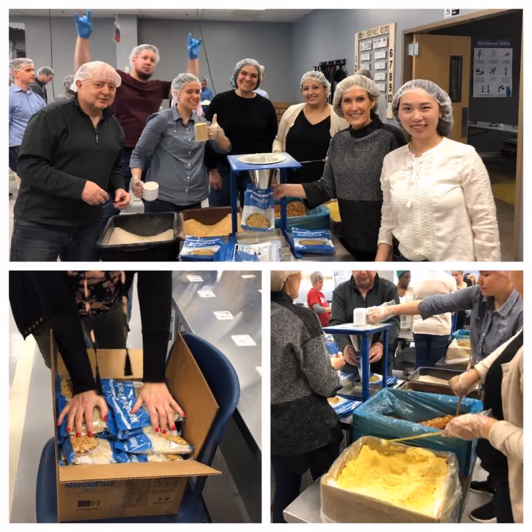 IDEX employees packing food for children in haiti