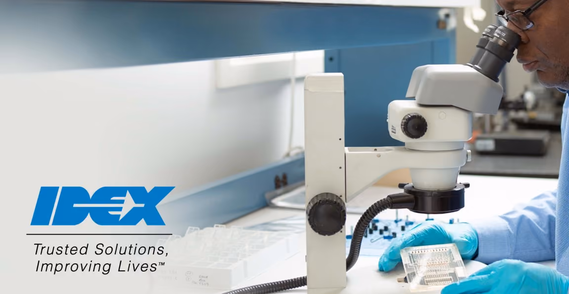 IDEX logo next to someone using a microscope
