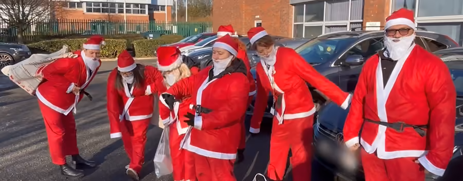 The Polymer Precision Engineering team dressed as Santa