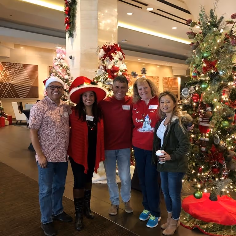 Photographs of Knight LLC team members at charity events (2)