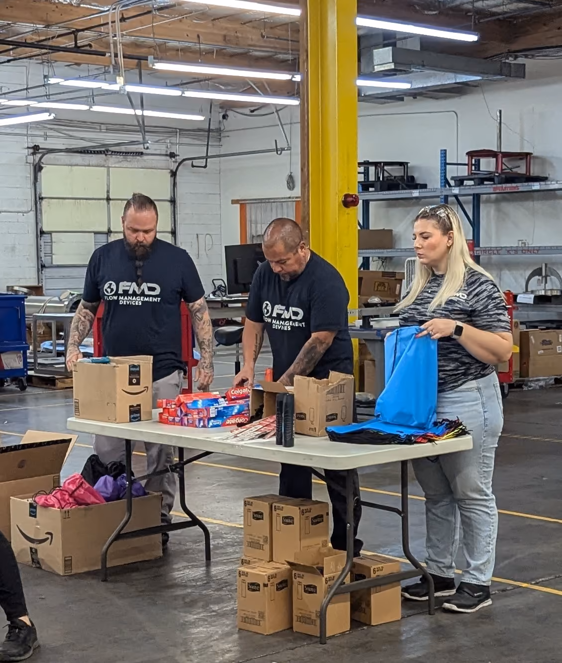 Flow Management Devices team assembling essential item kits