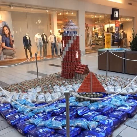 Food drive items assembled to look like a lighthouse