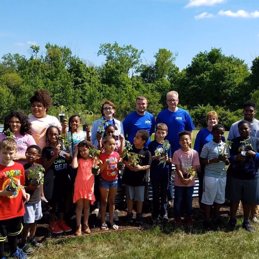 The Warren Rupp volunteers and local kids