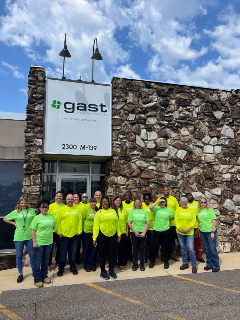 A photograph of the GAST team outside their office