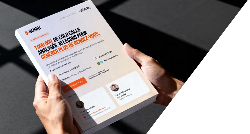 Hands holding a flyer advertising a cold call analysis event with tips to generate more appointments.