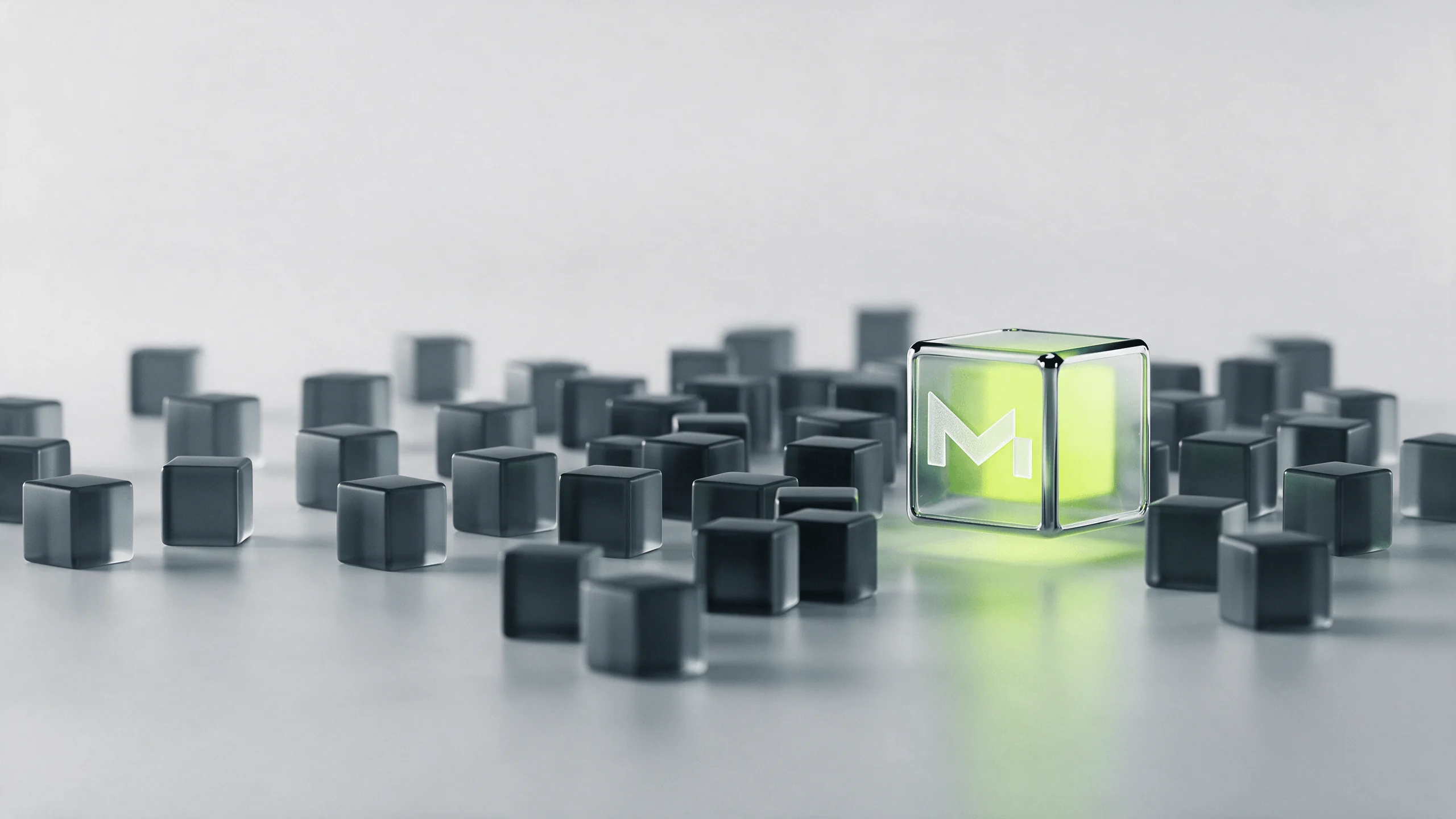 A transparent glass cube with a glowing green core and an M logo among grey cubes