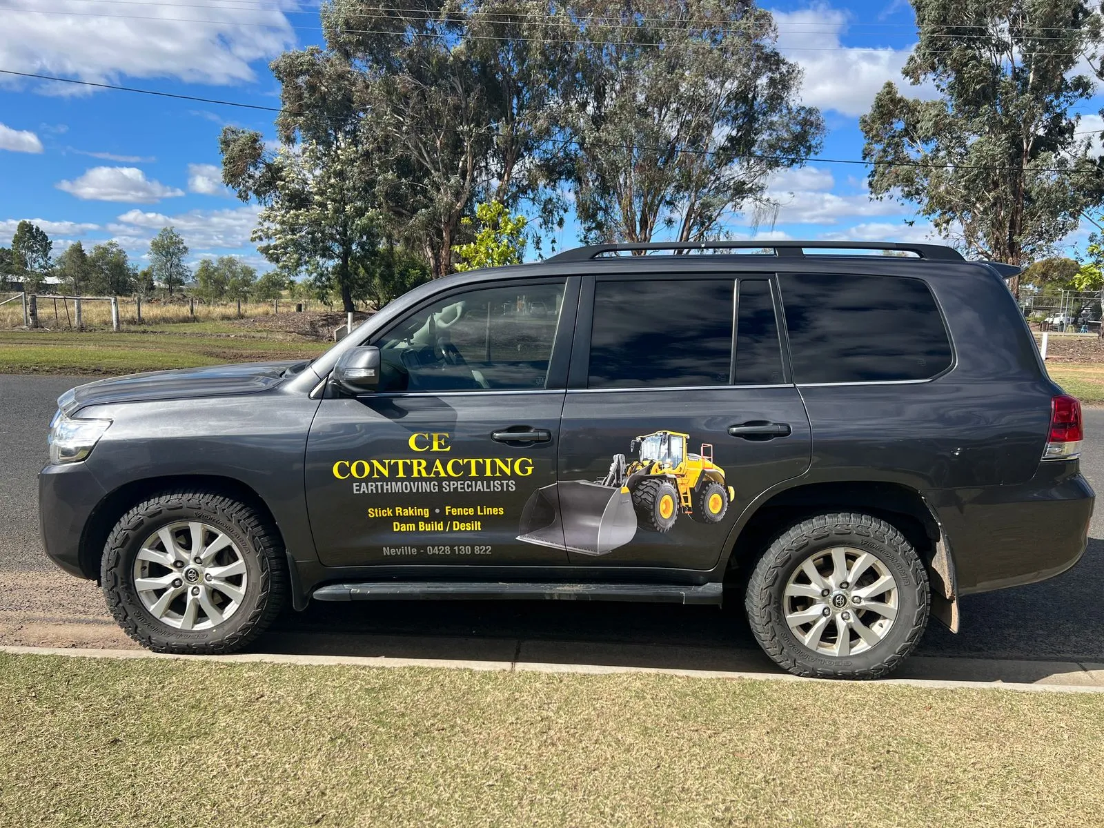 CE Contracting branded work vehicle on a job site in rural Queensland.