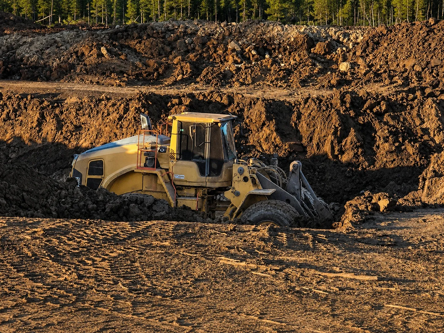 Volvo loader during dam construction earthworks in rural Queensland.