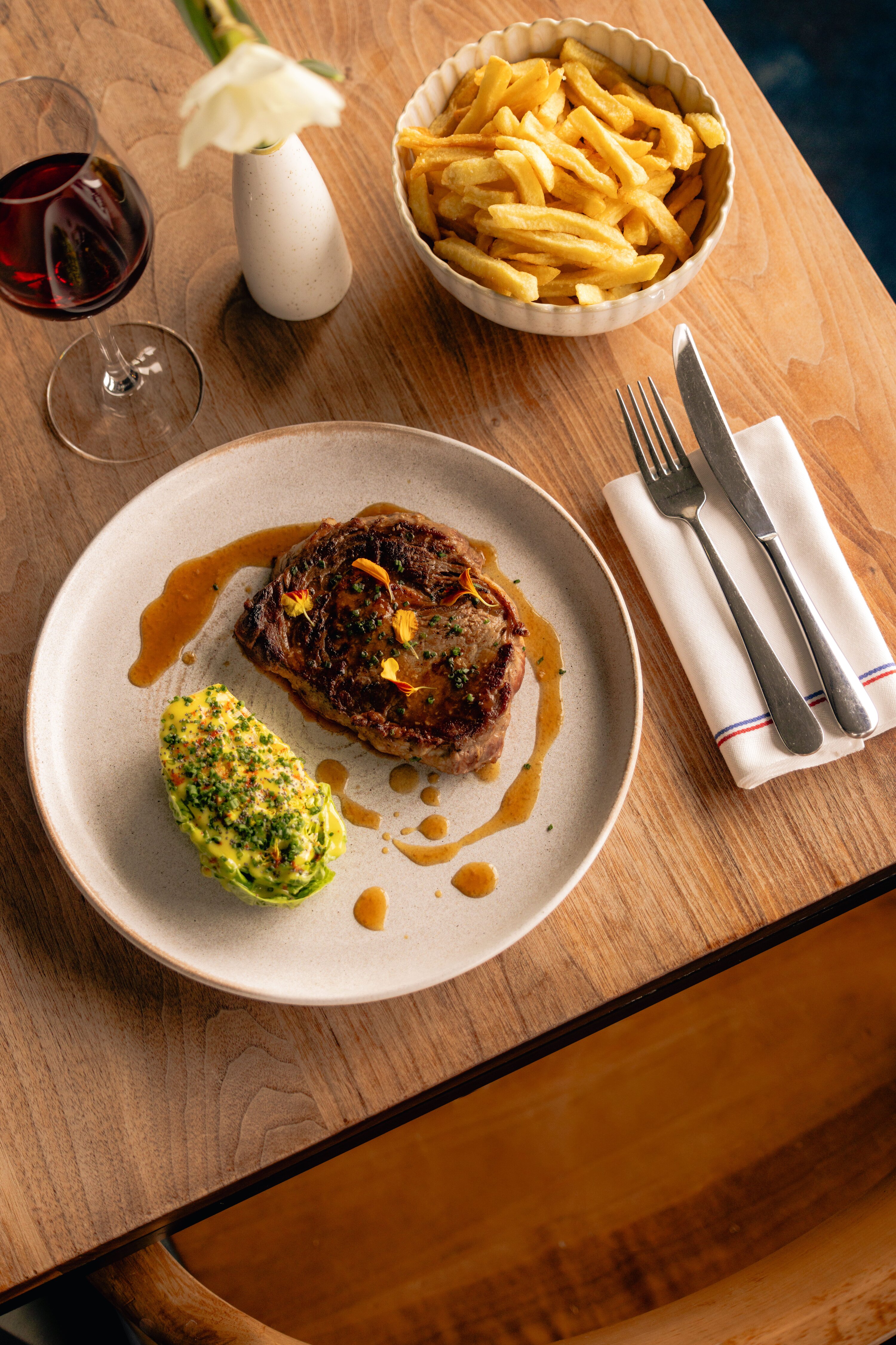 Lunch at the Edmond restaurant at the Terrass' Hotel Paris, featuring a rooftop terrace with panoramic views of the city.