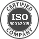 Round ISO 9001:2015 certified company badge in black and white.