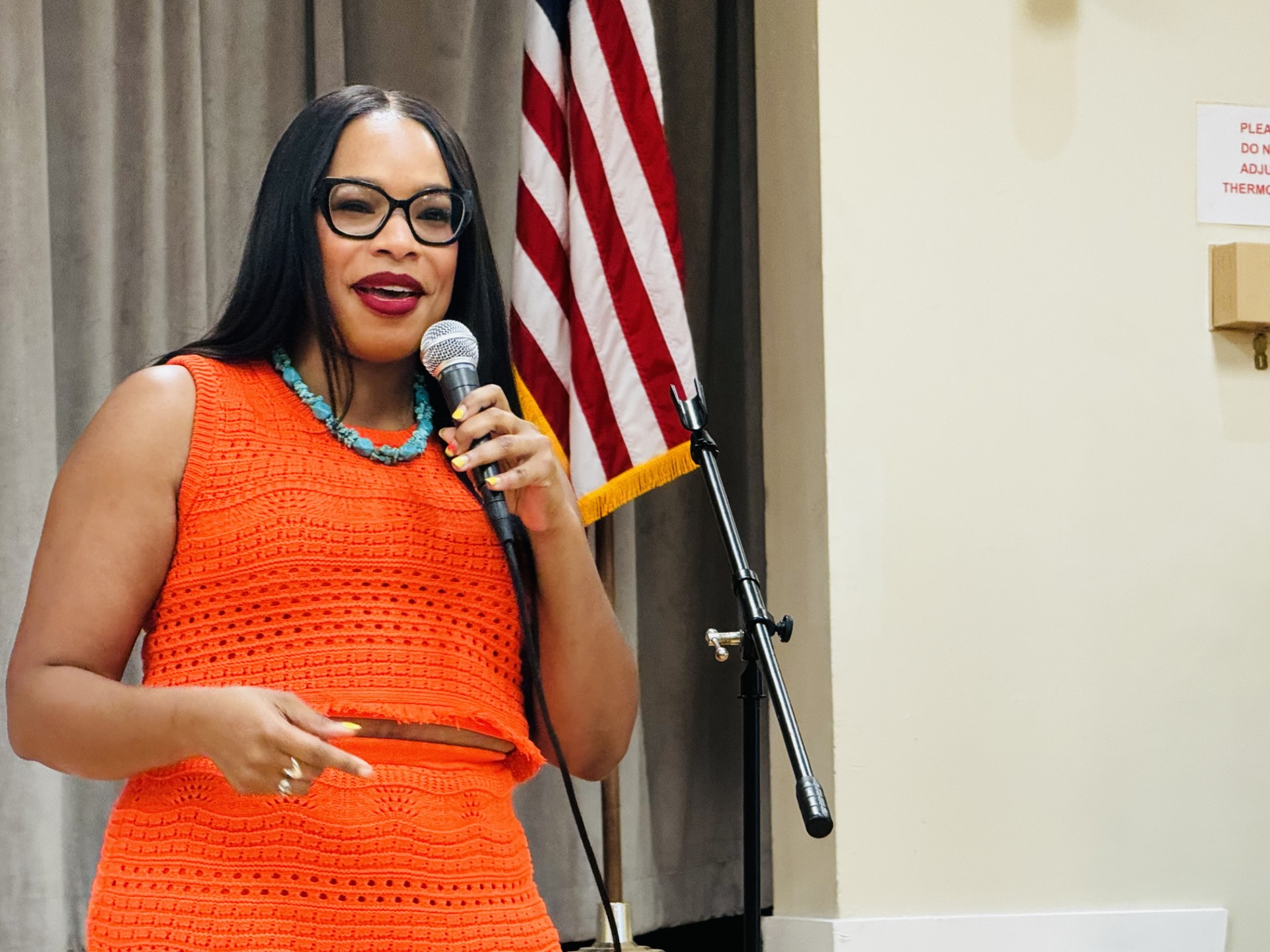 Kaysia Earley speaking on a panel at a conference