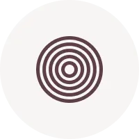 Concentric dark brown circles forming a target-like pattern on a light background.
