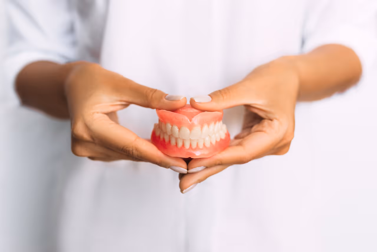 Should You Go for Implants or Stick with Dentures?