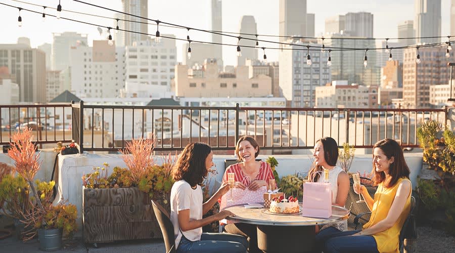 A group of women enjoying a roof terrace