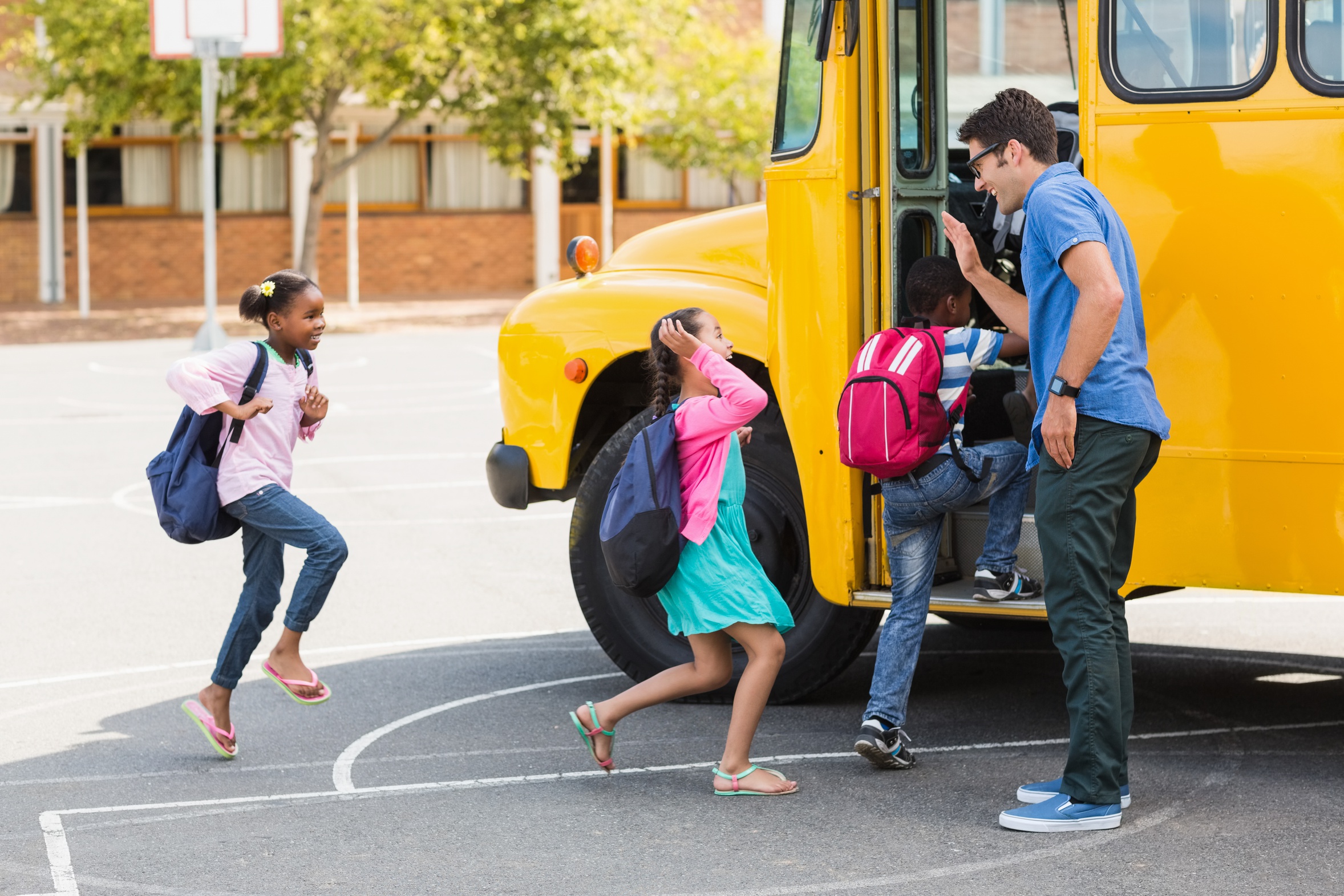 Children boarding a school bus