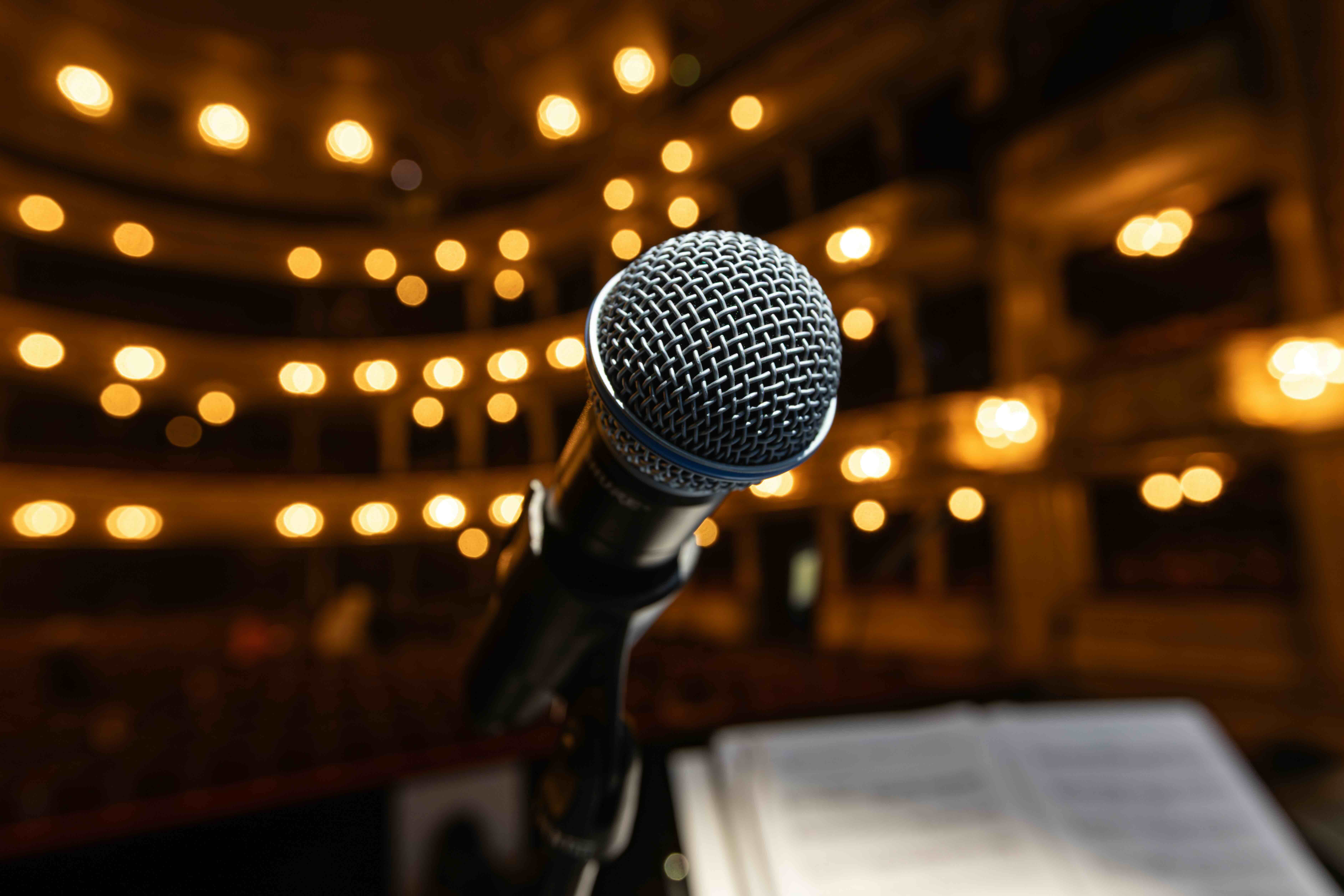 Microphone positioned for acoustic measurement in a room
